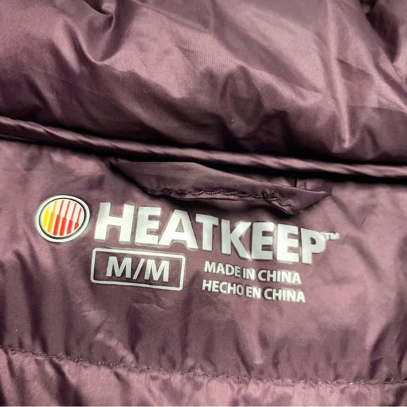 HeatKeep size medium puffer coat dark purple color does have a flaw on arm - Picture 4 of 9